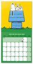 Wewnętrzna strona Kalendarza Snoopy z kalendarium i ilustracją